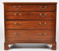 Lot 1458 - A late Georgian mahogany chest of four long...