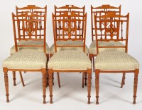 Lot 1476 - A set of six Edwardian satinwood salon chairs,...