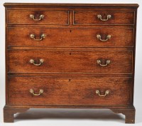 Lot 1483 - A George III oak chest of two short and three...