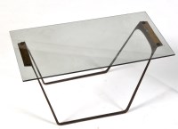 Lot 12 - A mid 20th Century bent metal and plate glass...