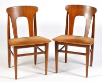 Lot 17 - Four mid 20th Century teak dining chairs, with...