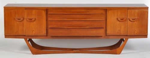 Lot 31 - G-Plan: a teak sideboard, fitted three short...