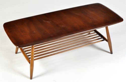 Lot 68 - Ercol: a dark stained elm coffee table,...