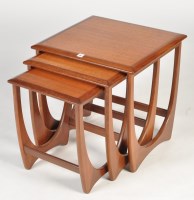 Lot 87 - G-Plan: a nest of three teak occasional tables,...