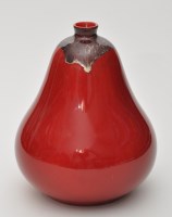 Lot 126 - Royal Doulton: a red flambé pear-shaped vase,...