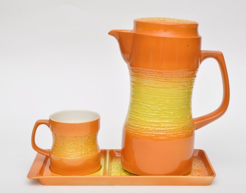 Lot 130 - Carlton Ware: a coffee pot, mug and stand,...