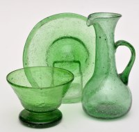 Lot 137 - Possibly Clutha: a green hand-blown glass...
