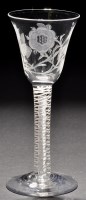 Lot 216 - A Jacobite wine glass, the drawn trumpet bowl...
