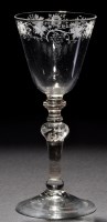Lot 230 - A light baluster goblet, the round funnel bowl...