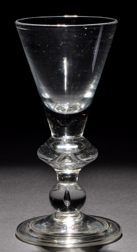 Lot 237 - A heavy baluster goblet, the conical bowl with...