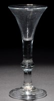 Lot 240 - A drawn trumpet baluster wine glass of the...