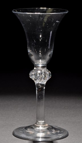 Lot 241 - A light baluster wine glass, the bell bowl...
