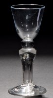 Lot 252 - A round funnel wine glass, raised on a ball...