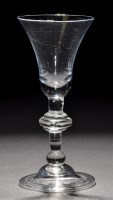 Lot 264 - A baluster wine glass, the bell bowl with a...