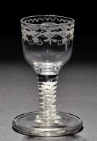 Lot 268 - A dram glass, the ogee bowl engraved with...