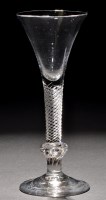 Lot 277 - A composite stem wine glass, the trumpet bowl...