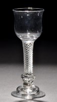Lot 279 - A composite wine glass, the tulip bowl raised...
