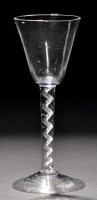 Lot 281 - A tall round funnel bowl wine glass, raised on...