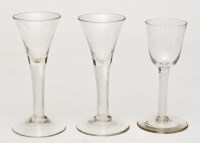 Lot 294 - Pair of air twist wine glasses, drawn trumpet...