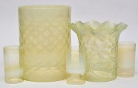 Lot 307 - Five cylindrical form vaseline glass shades,...
