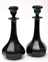 Lot 319 - Pair of nine sided green glass decanters and...