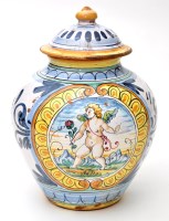 Lot 384 - Maiolica jar and cover, pear-shaped body with...