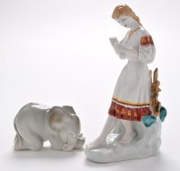 Lot 392 - Two Russian figures, comprising: kneeling...