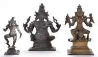 Lot 399 - Three brass Hindu figures, including seated...