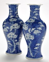 Lot 423 - Pair of Chinese blue and white inverted...