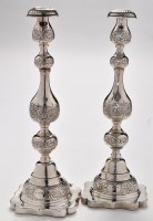 Lot 473 - A pair of George V Sabbath candlesticks, by...