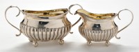 Lot 501 - A George III two-handled sugar bowl and...