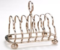 Lot 507 - An Edwardian seven bar toast rack, by Walker &...