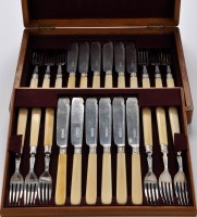 Lot 515 - Twelve Edwardian silver and ivory fish knives,...