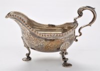 Lot 523A - A George III gravy boat, by Daniel Smith and...