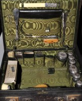 Lot 537 - An Edwardian gentleman's leather dressing case,...