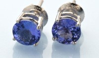 Lot 601 - A pair of ''Rhapsody'' tanzanite stud earrings,...