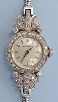 Lot 620 - Movado: a ladies white precious metal and...