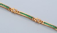 Lot 622 - An emerald and diamond bracelet, the...