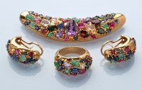 Lot 636 - A late 20th Century gemstone set yellow metal...