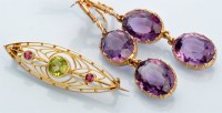 Lot 645 - A pair of 19th Century amethyst drop earrings,...