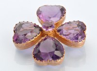 Lot 647 - A late 19th Century amethyst brooch, of four...