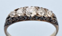 Lot 653 - A Victorian five stone diamond ring, the...