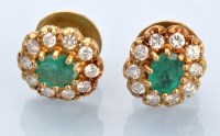 Lot 656 - A pair emerald and diamond cluster stud...