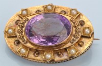 Lot 685 - A Victorian amethyst half pearl and yellow...