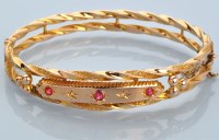 Lot 692 - A Victorian style ruby, diamond and 9ct....