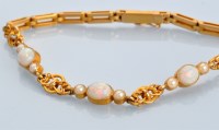 Lot 695 - A late 19th Century opal, half pearl and...