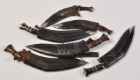 Lot 733 - Six Nepalese kukri knives, the single-edged...