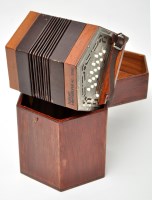 Lot 783 - A hexagonal concertina, by Hohner...