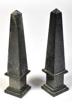 Lot 826 - A pair of 19th Century black marble obelisks,...