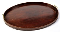 Lot 842 - A late 19th Century mahogany oval tray, the...